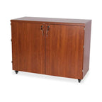 Sewing cabinet teak wood with two doors by Kangaroo Sewing Furniture on casters
