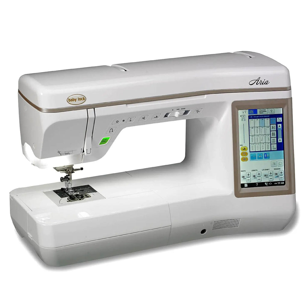 Baby Lock Aria sewing machine with touchscreen display, white with beige trim.