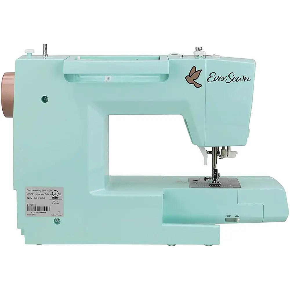 EverSewn Sparrow 30S sewing machine in turquoise with included extension table.