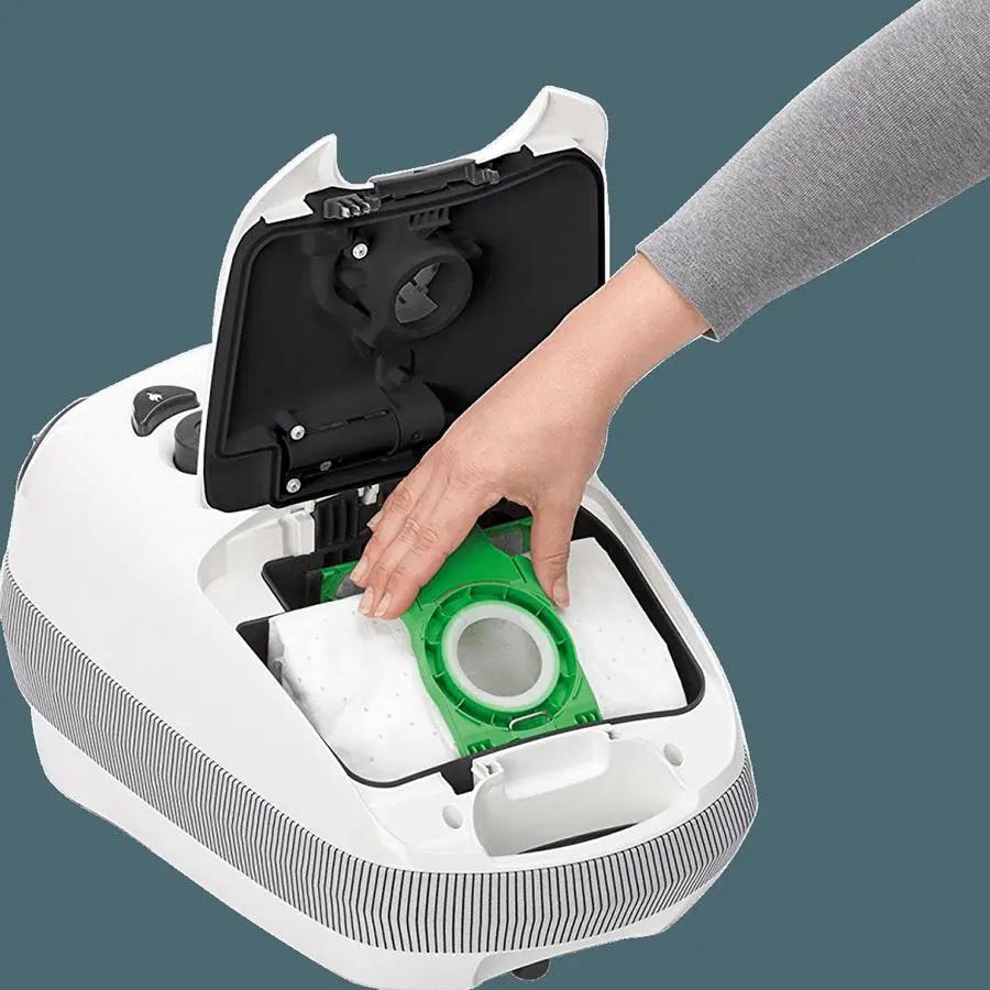 SEBO AIRBELT E3 Premium canister vacuum, Arctic White; open top shows green filter cartridge.