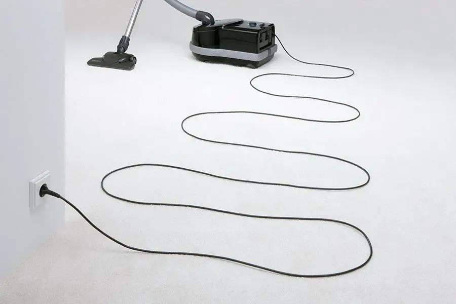 SEBO AIRBELT D4 Premium canister vacuum, black with gray accents.