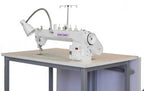 Encore Elite 18 Long Arm Quilting Machine on a sturdy gray table with built-in lamp
