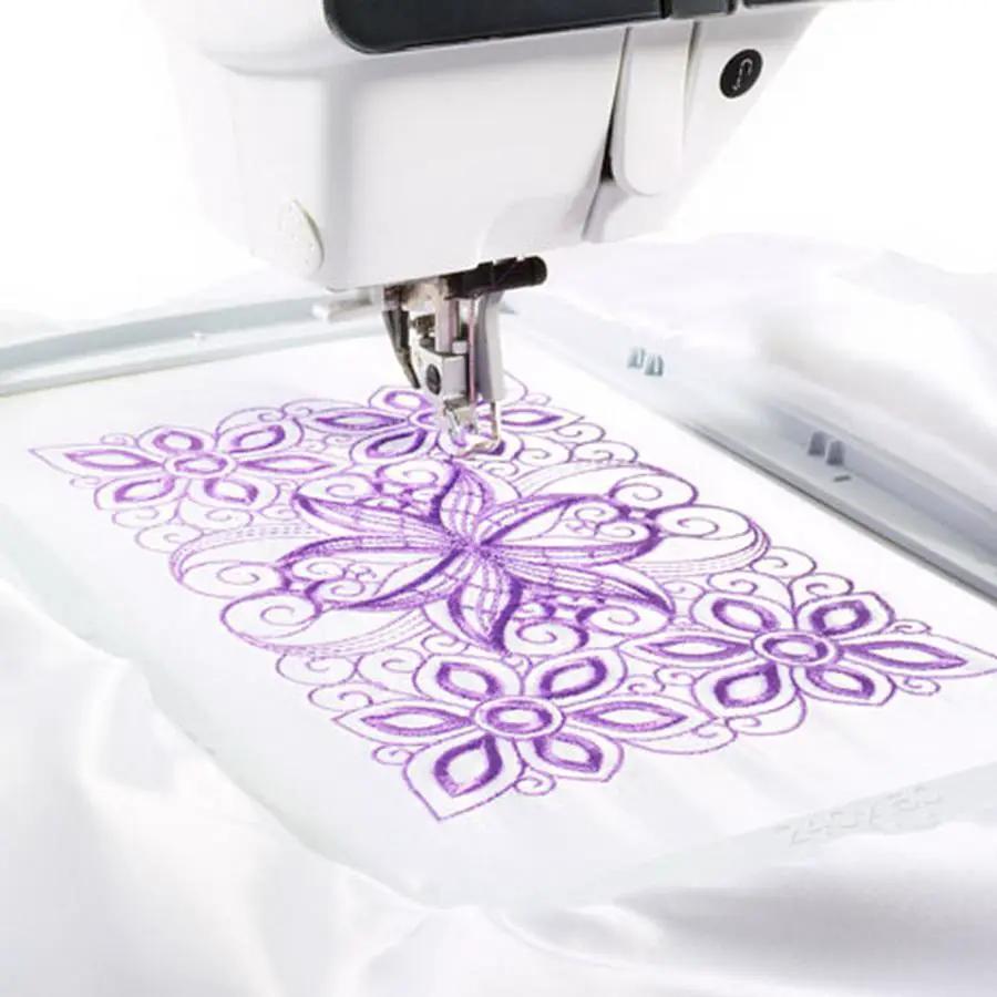 Sew Tech embroidery hoop 240mm x 150mm PA502 on white fabric with a purple floral design