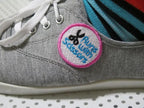 DIME Patch Maker Kit Stabilizer Bundle; gray sneaker with pink-bordered circular embroidered patch.