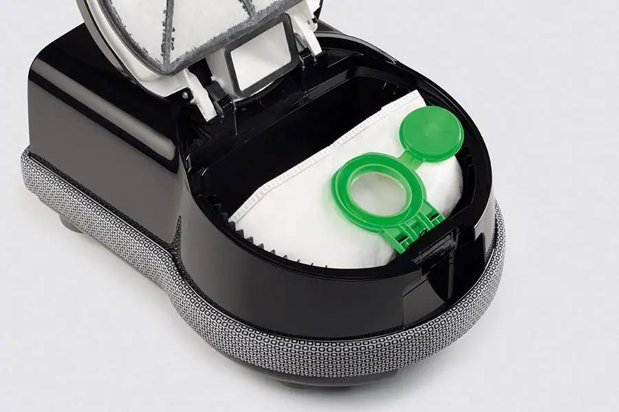 SEBO Airbelt D4 Premium canister vacuum, black finish with white dust bag and green cap