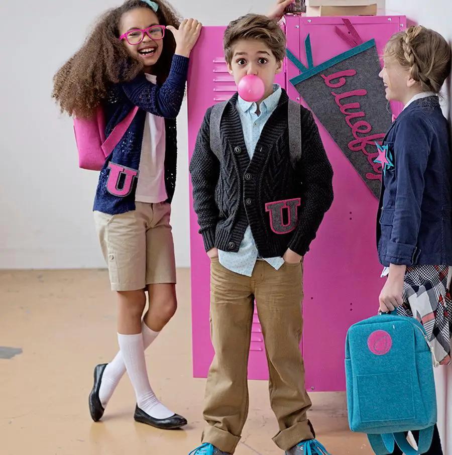 Bluefig University Learn to Sew Kit Lil Ruck Class 300 fabric kit; three kids pose by a pink locker.
