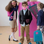 Bluefig University Learn to Sew Kit Lil Ruck Class 300 fabric kit; three kids pose by a pink locker.