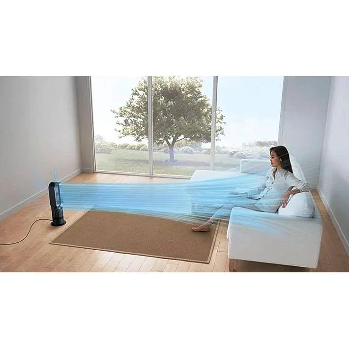 Dyson Hot+Cold Jet Focus Fan AM09 in white; bladeless heater/fan directing cool air to a woman on a sofa.