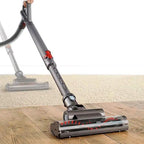 Dyson Ball Multi Floor Canister Vacuum DC39 on hardwood floor with gray body and long wand.