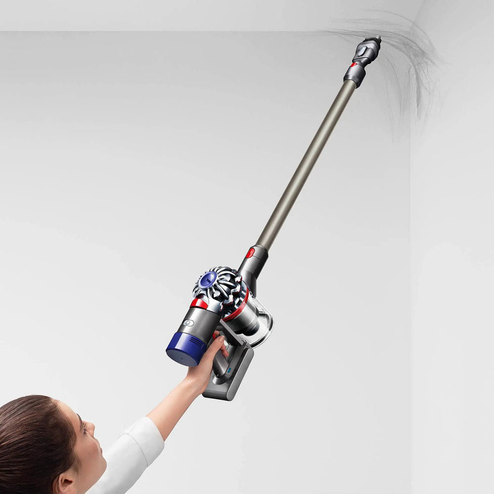 Dyson V8 Animal vacuum with long metallic wand and visible cyclone head