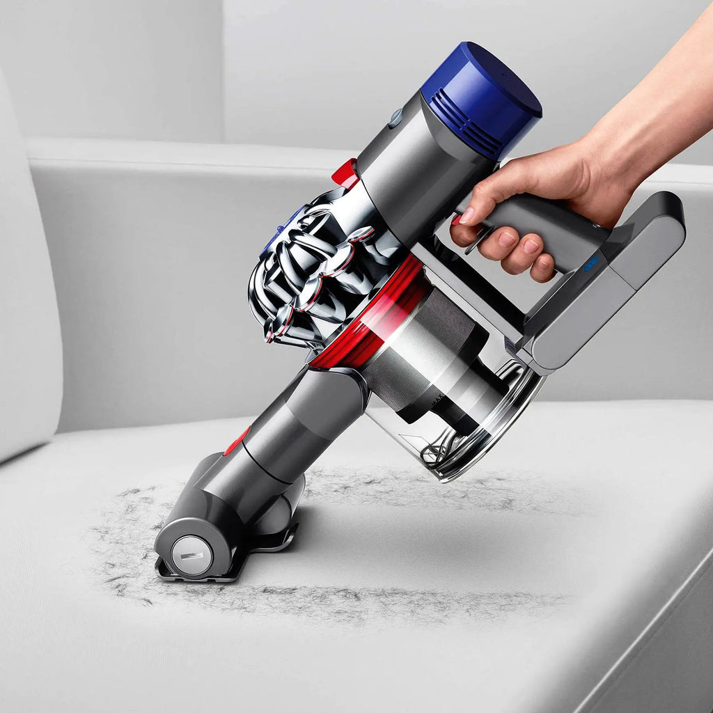 Dyson V8 Animal vacuum; cordless cleaner with blue cyclone and bottom-release dust cup.