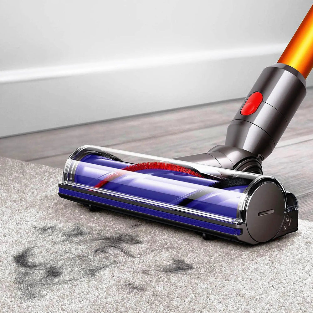 Dyson V8 Absolute SV10 vacuum cleaner with silver body, orange wand, and red power button.