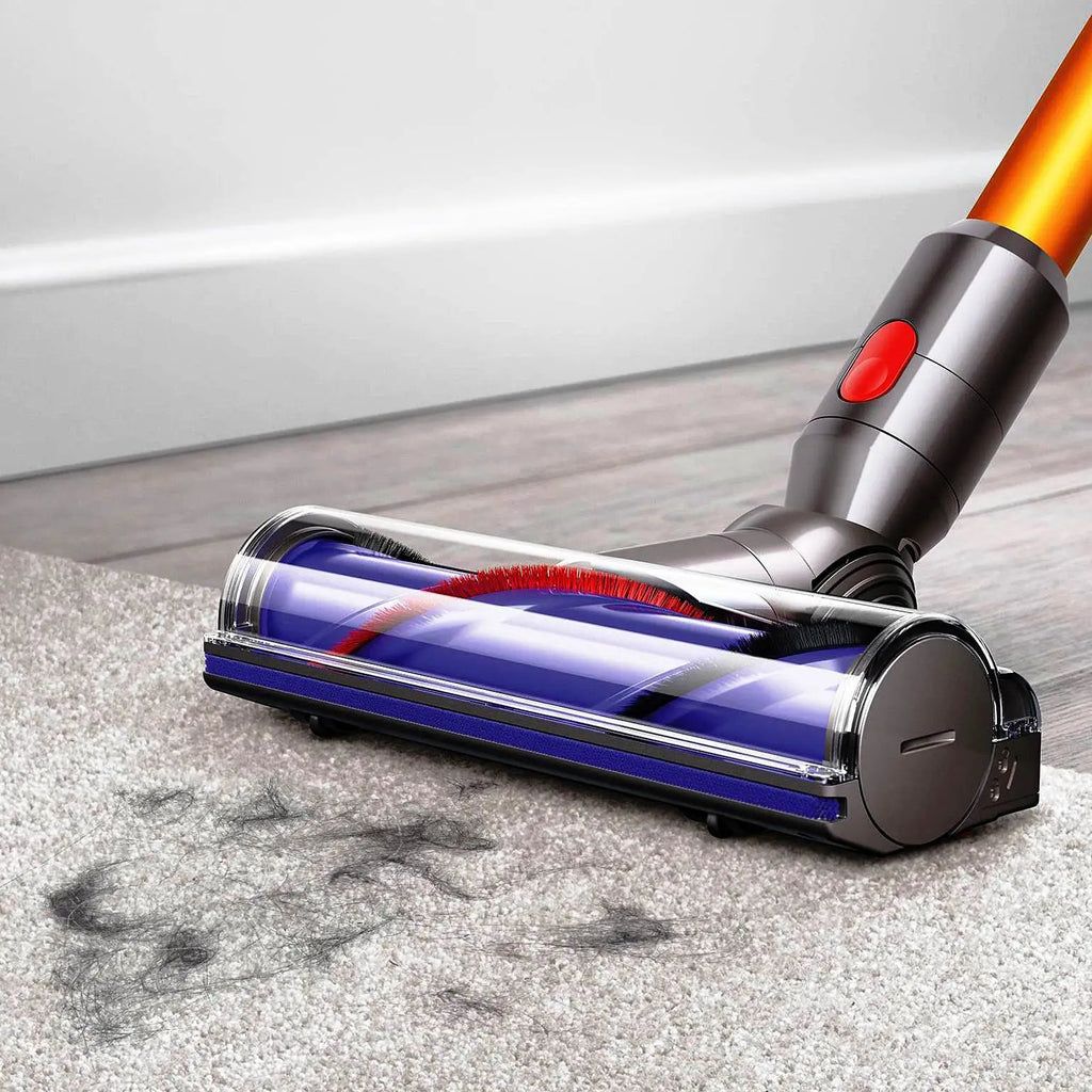Dyson V8 Absolute SV10 vacuum cleaner with silver body, orange wand, and red power button.
