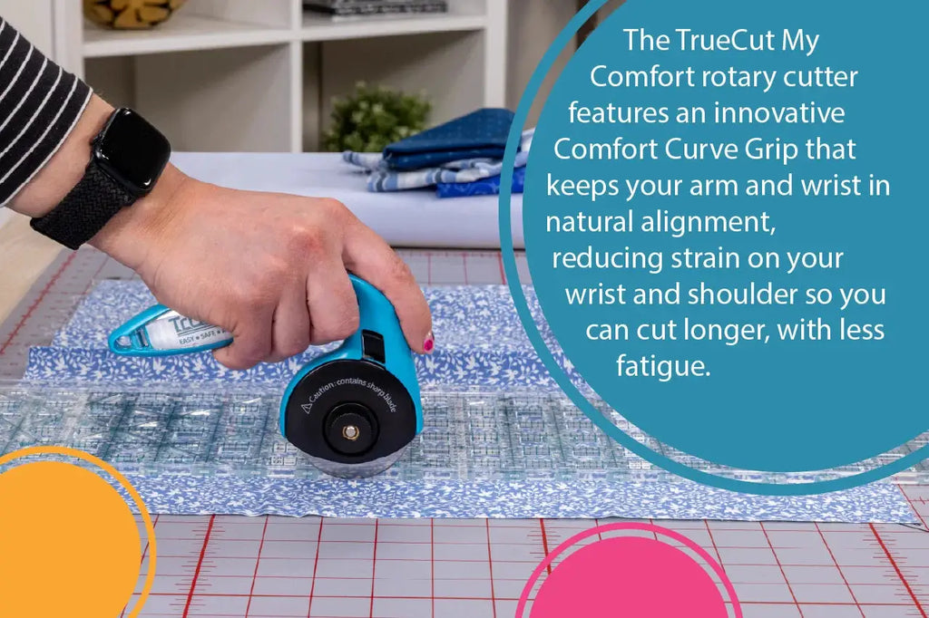 Grace TrueCut 28mm rotary cutter, turquoise blue with comfort grip.