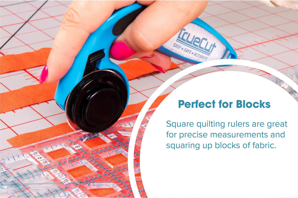 Grace Company TrueCut Original 12.5in x 12.5in quilting ruler, blue, on fabric with a cutting mat.