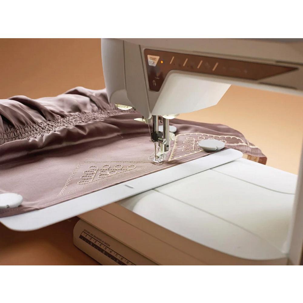 Husqvarna Viking Designer Topaz 40 Sewing and Embroidery Machine - Sewingmachinesplus.com