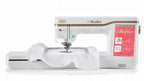 Baby Lock Meridian embroidery machine in white with gold-brown accent and embroidery hoop.