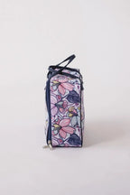 Bluefig Quilter Deluxe Combo bag in floral purple-pink print with navy trim and zipper