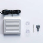 Janome Derby Line portable sewing machine accessory kit with white foot pedal, power cord, spool caps, needle tool