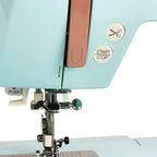 EverSewn Sparrow 30S sewing machine in teal with extension table