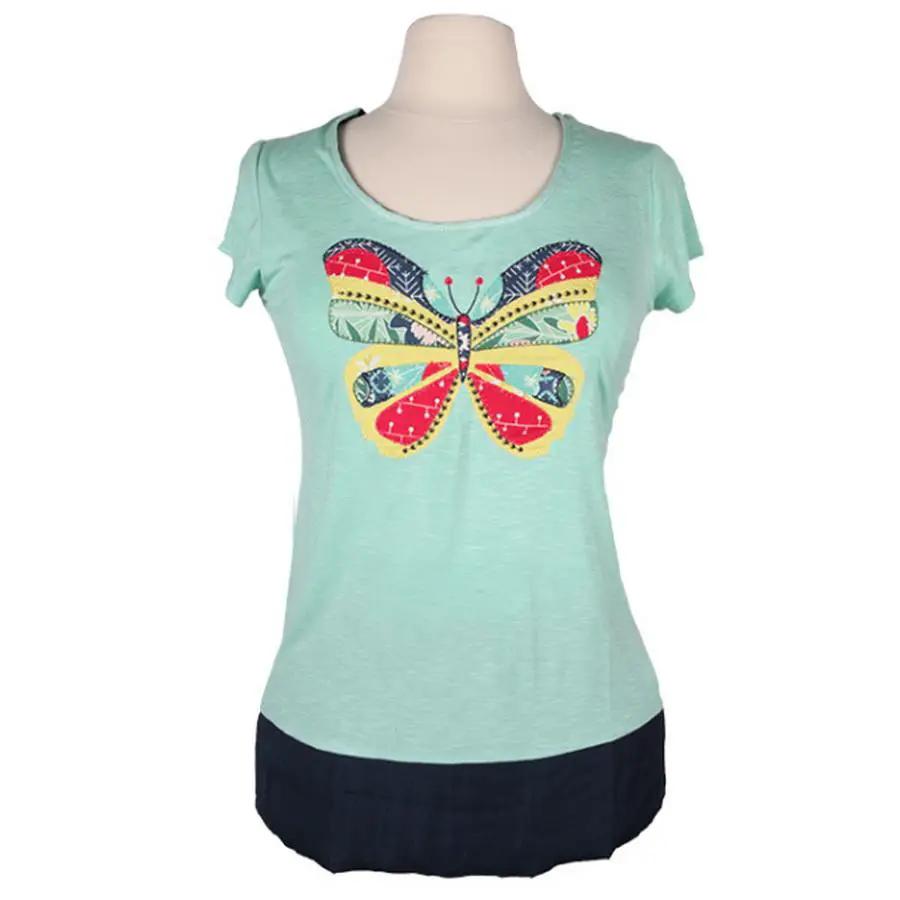 T-shirt featuring a large colorful butterfly graphic on mint green fabric