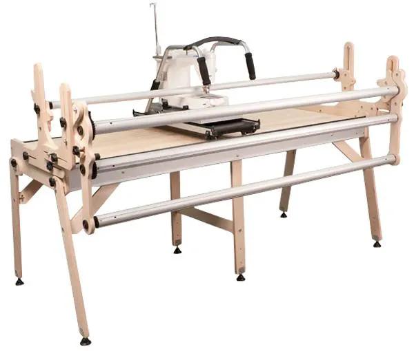GMQ-Pro No Baste Machine Quilter on Grace Company quilting frame with wood and metal rails