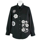 Anita Goodesign Fantasy Floral 178AGHD embroidery design on black button-down shirt with white floral motifs