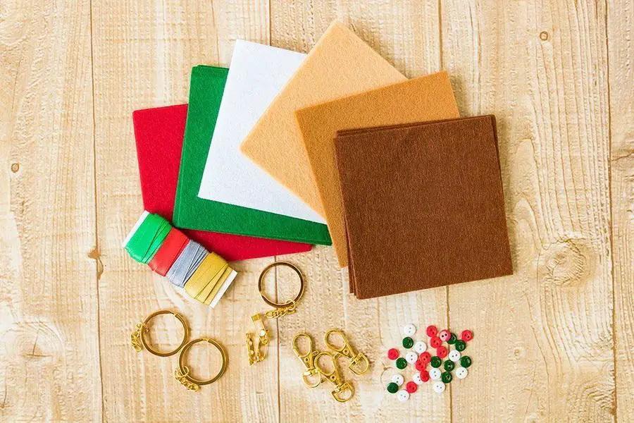 Gemini Embellishment Pack - Festive: colorful felt sheets, threads, metal findings, rings, and beads