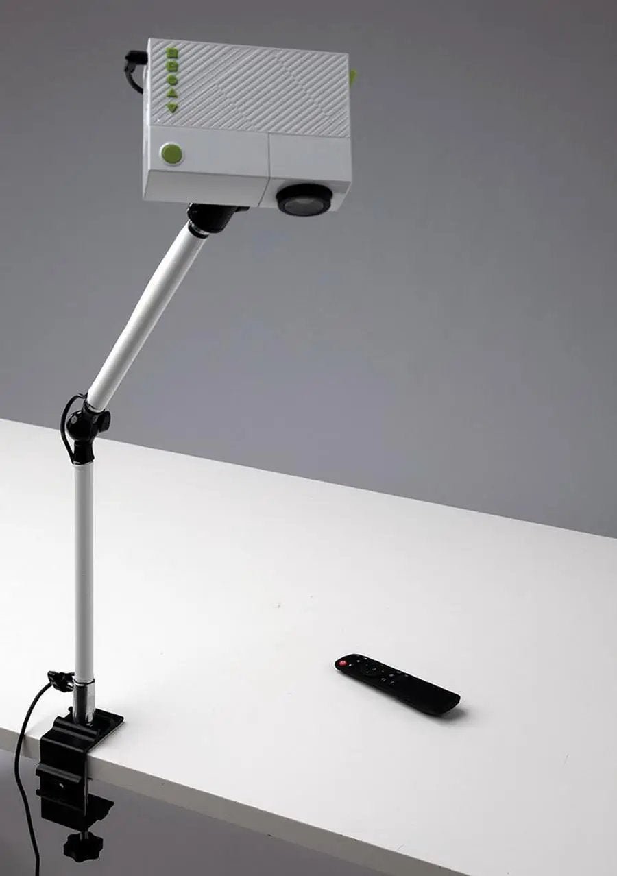 DIME Maximum View Projector on an adjustable white stand with remote