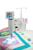 Handi Quilter Sweet Sixteen long-arm sit-down quilting machine, gray with touchscreen display