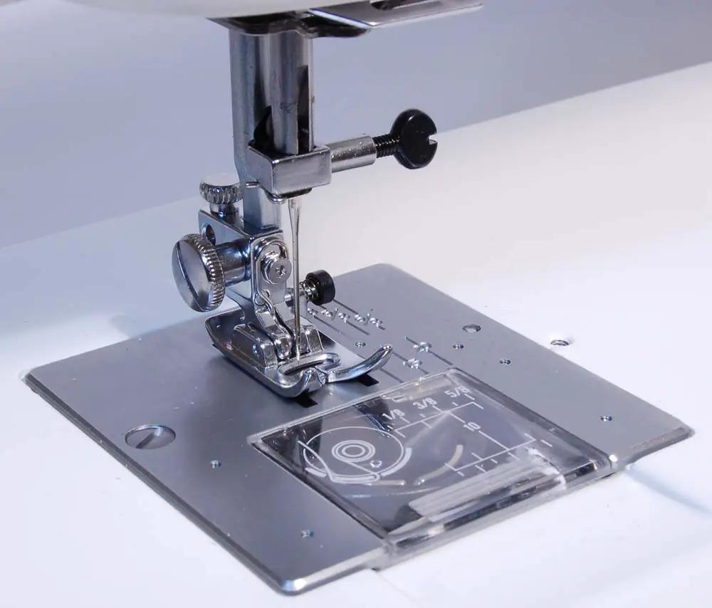 Refurbished Janome 712T treadle sewing machine; chrome metal body with needle plate and presser foot