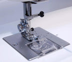 Refurbished Janome 712T treadle sewing machine; chrome metal body with needle plate and presser foot