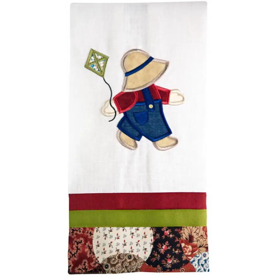 Anita Goodesign Sunbonnet Sue and Sam embroidery design on white fabric with patchwork border