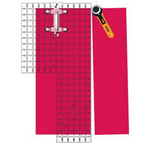 Quilt Ruler Connector by Guidelines 4 Quilting; pink ruler with grid markings and white grid ruler visible