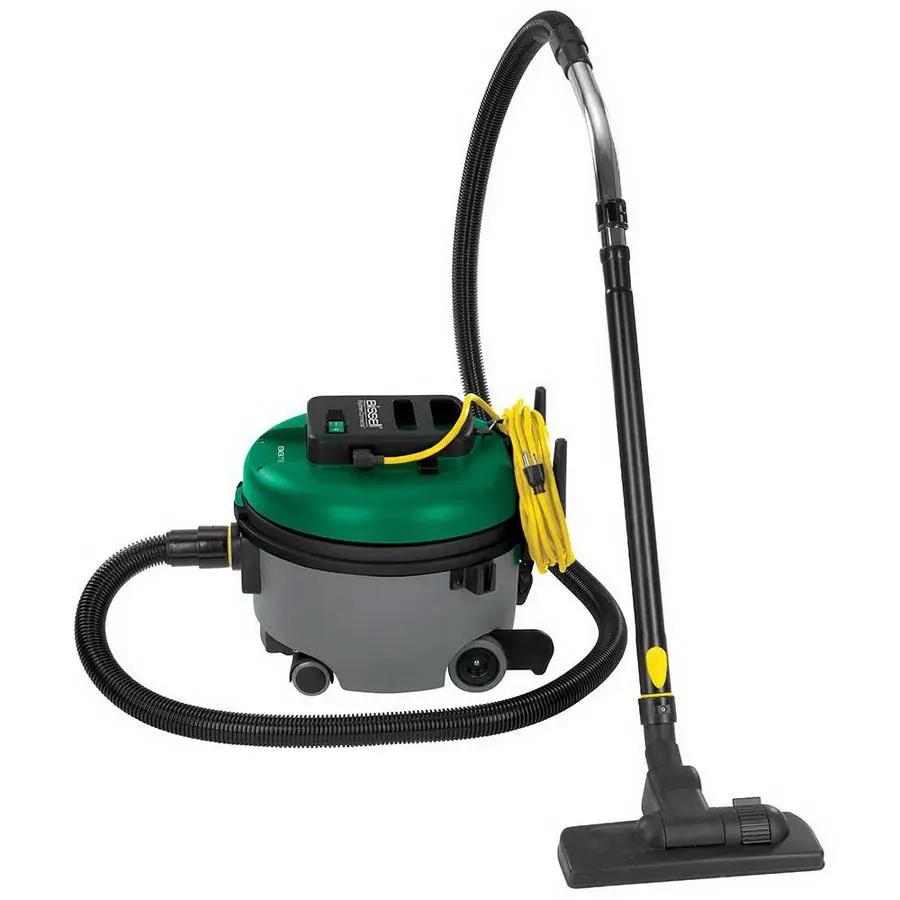 Bissell BGCOMP9H Canister Vacuum with green canister, long wand, and yellow cord.