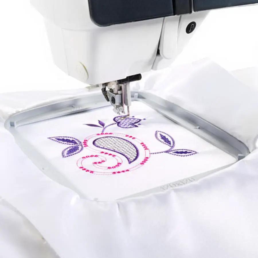 Sew Tech 120x120mm embroidery hoop, white, with purple floral embroidery on an embroidery machine