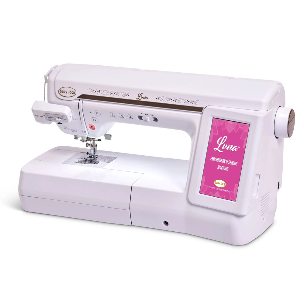 Baby Lock Luna sewing and embroidery machine, white with floral detailing and pink display panel