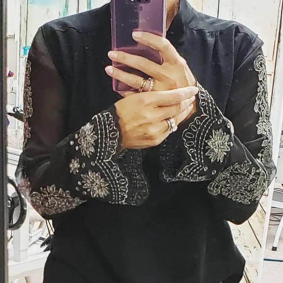 Touch of Lace blouse by Angela Wolf, black top with white embroidered lace sleeves