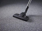 Miele Classic C1 Pure Suction Canister Vacuum, graphite grey, on carpet