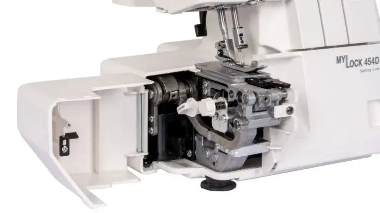 Janome MyLock 454D serger, white, close-up of internal threading and knife assembly