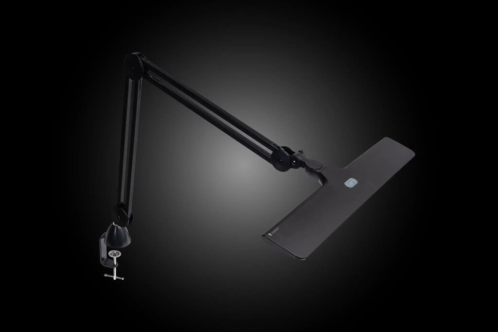 Lumi Task Lamp satin black by Daylight, adjustable desk lamp.