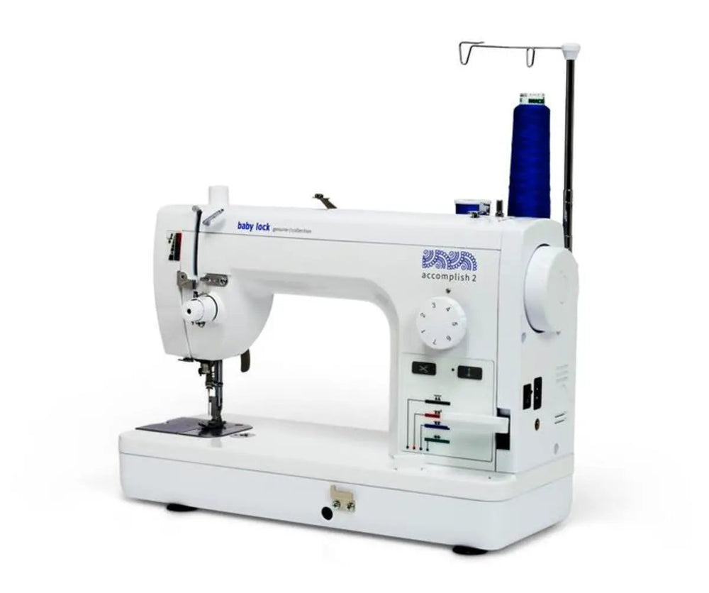 Baby Lock Accomplish 2 sewing machine, white mechanical model with thread spool and dial controls