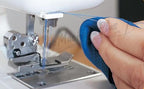 Janome 1000CPX Cover Pro coverstitch machine, refurbished, sewing blue fabric