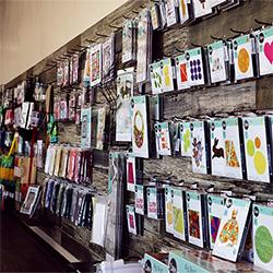 Different type of sewing products hanging in a row