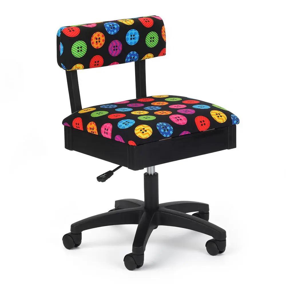 Kangaroo Sewing Furniture chair with colorful button-pattern upholstery and air-lift, black wheeled base.