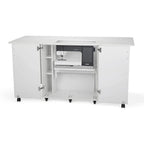 Kangaroo Kabinet Emu sewing cabinet in white with a Pfaff sewing machine inside.