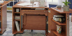 Sewing cabinet Koala Studios Heritage Cub in teak with built-in side shelves and sewing machine on top.