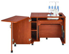 Koala Studios Heritage Cub Sewing Cabinet in teak with sewing machine, drop-down extension and mobile storage shelves
