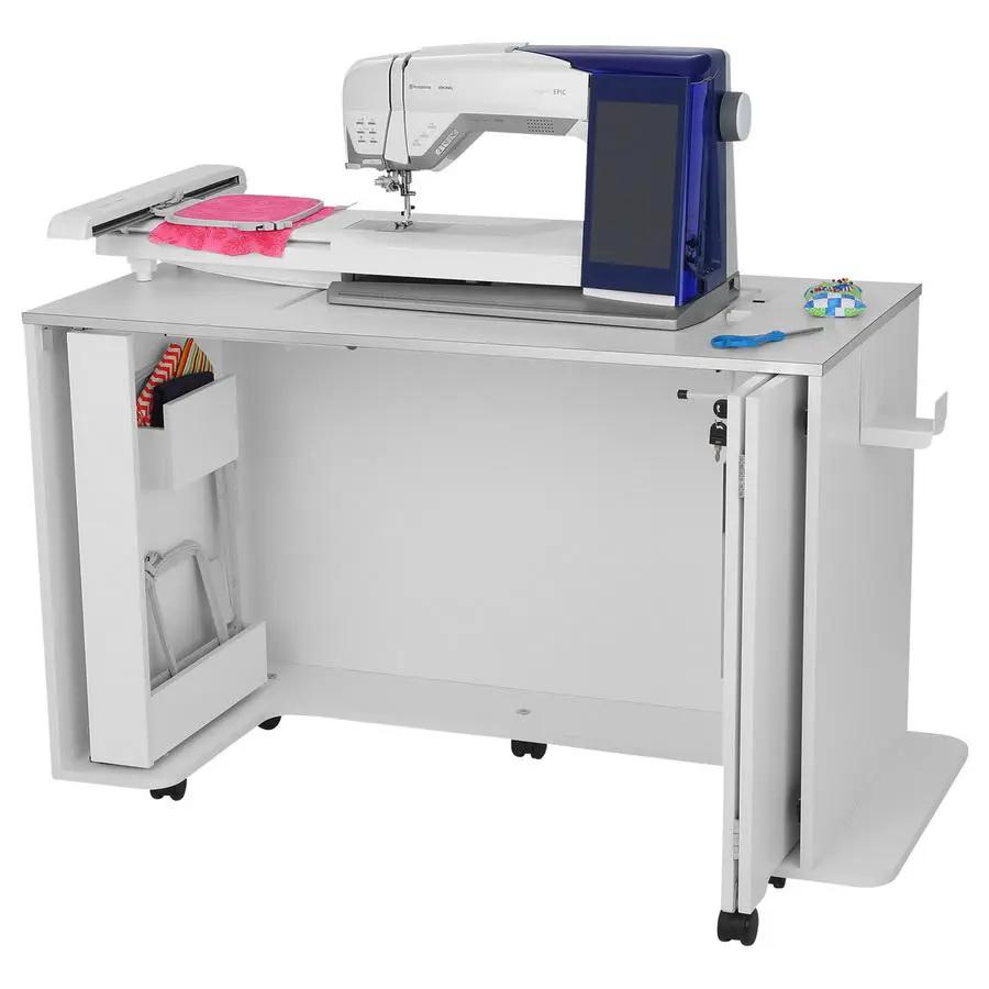 Arrow sewing cabinet with manual lift; white rolling cabinet with blue Arrow sewing machine on top.