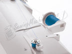Singer 6199 Brilliance electronic sewing machine in white with blue thread spools.